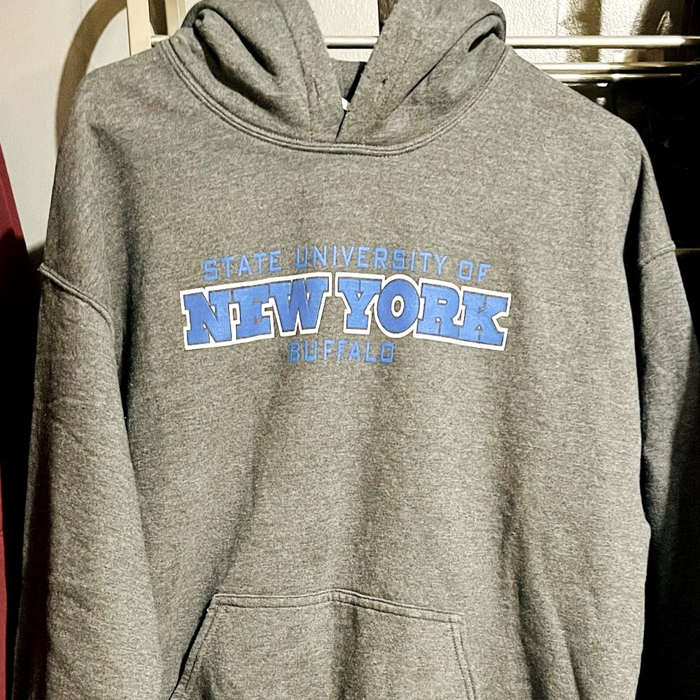 Official “University of Buffalo” Woman’s grey hooded sweatshirt.